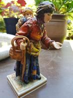 Bedelares met kind (Capodimonte), Ophalen
