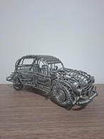 Handgemaakt auto sculptuur, Ophalen