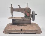 naaimachine voor speelgoed, Ophalen