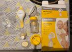 Medela Harmony manuele borstkolf – met doos & accessoires, Ophalen of Verzenden, Zo goed als nieuw, Borstkolf