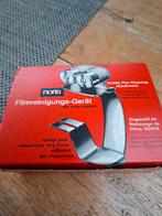 Noris filmreinigingsapparaat, Enlèvement