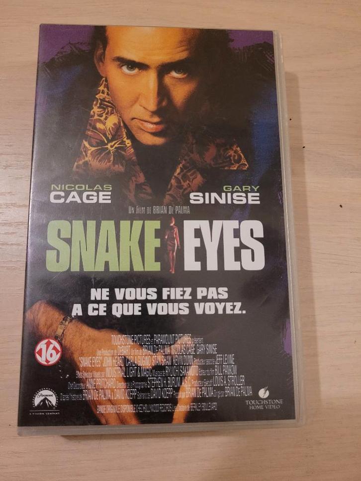 k7 vhs Snake Eyes, Cd's en Dvd's, VHS | Film, Zo goed als nieuw, Thrillers en Misdaad, Ophalen of Verzenden