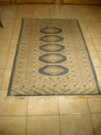 Een handgeknoopt Pakistaans wollen tapijt., Pakistaans, Zo goed als nieuw, Crème, 150 tot 200 cm