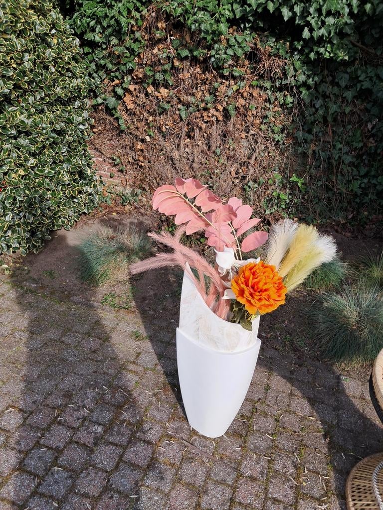 Deze decoratieve set bestaat uit kunstbloemen, Ophalen