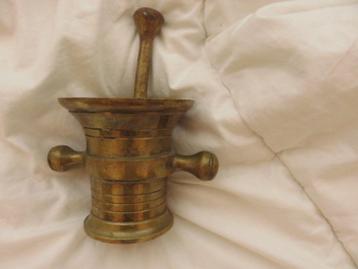 Koperen vijzel en stamper beschikbaar voor biedingen