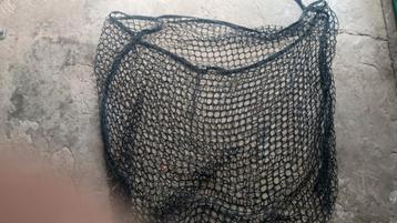 Filet a foin a suspendre, Enlèvement