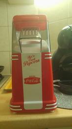 machine a popcorn, Ophalen