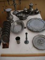 lot tinnen borden, vazen, kannen en kandelaars, Enlèvement