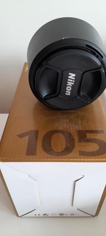 Nikon 105 F1.4 comme neuf beschikbaar voor biedingen