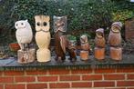 Houten versierde uilensculpturen, Ophalen