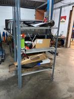10 staanders en pallet legboorden, Ophalen