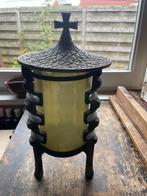 bronzen lantaarn, Ophalen