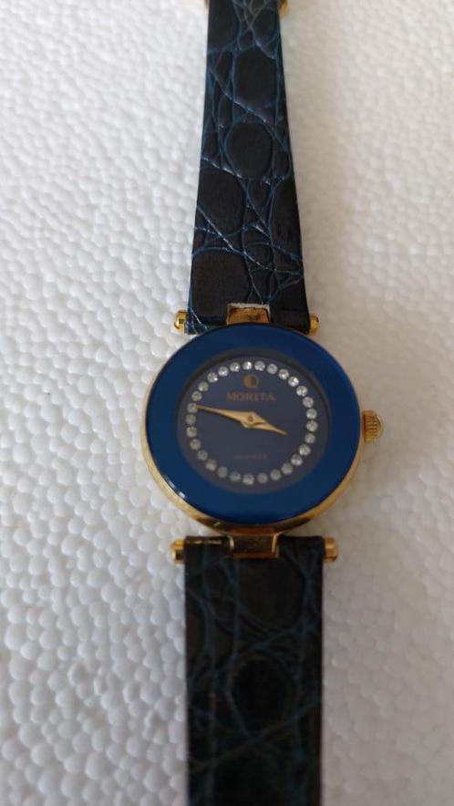 Polshorloge blauw, Handtassen en Accessoires, Horloges | Dames, Zo goed als nieuw, Polshorloge, Overige merken, Staal, Staal, Met strass