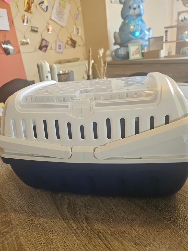 Draagbak voor klein dier, Ophalen