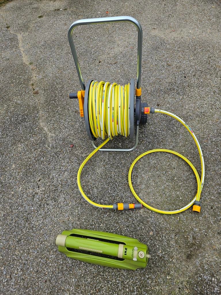 Tuinslang op haspel L =50 meter  + toebehoren in Houthalen, Tuin en Terras, Ophalen, Tuinslang