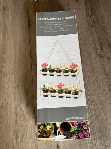 Bloempothouder beschikbaar voor biedingen