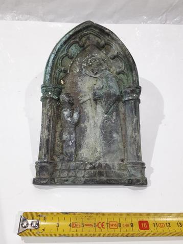 Kleine bronzen schoorsteenplaat beschikbaar voor biedingen