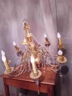 lustre Marie Thérèse recouvert à la feuille d'or, Enlèvement