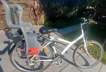 Heren fiets met kinderstoel en 21 versnellingen beschikbaar voor biedingen