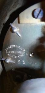 Klok+kandelaars, Ophalen