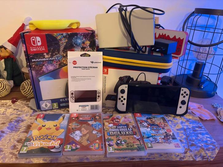 Nirendo switch oled met games, Games en Spelcomputers, Spelcomputers | Nintendo Switch, Zo goed als nieuw, Switch OLED, Met games