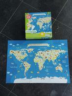 Puzzle map monde, Comme neuf