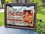 Vintage Coca-Cola reclamespiegel, Ophalen