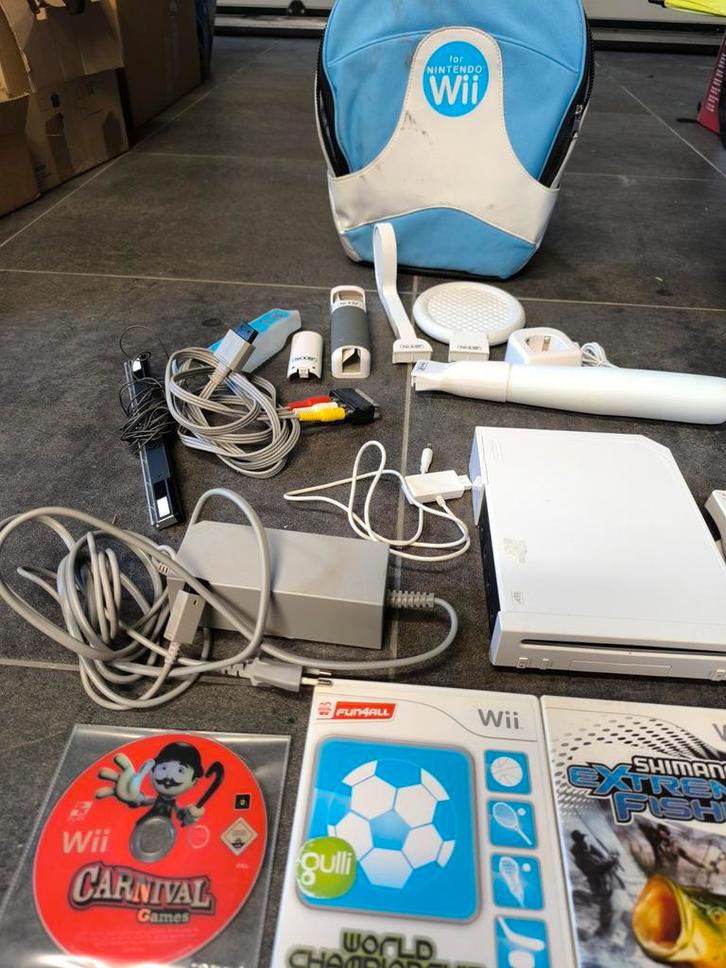 Nintendo Wii , 4 spelletjes , tas,..., Games en Spelcomputers, Spelcomputers | Nintendo Wii, Gebruikt, Ophalen of Verzenden