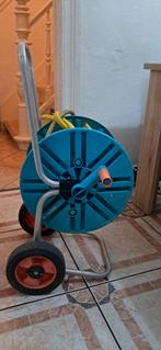 Gardena winder/dispenser met tuinslang in goede staat, Tuin en Terras, Tuinslangen, Ophalen, Zo goed als nieuw, Tuinslanghaspel