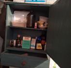 Vintage apotheekkast, Ophalen