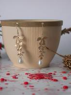 Lange bladjes met parel, Verzenden