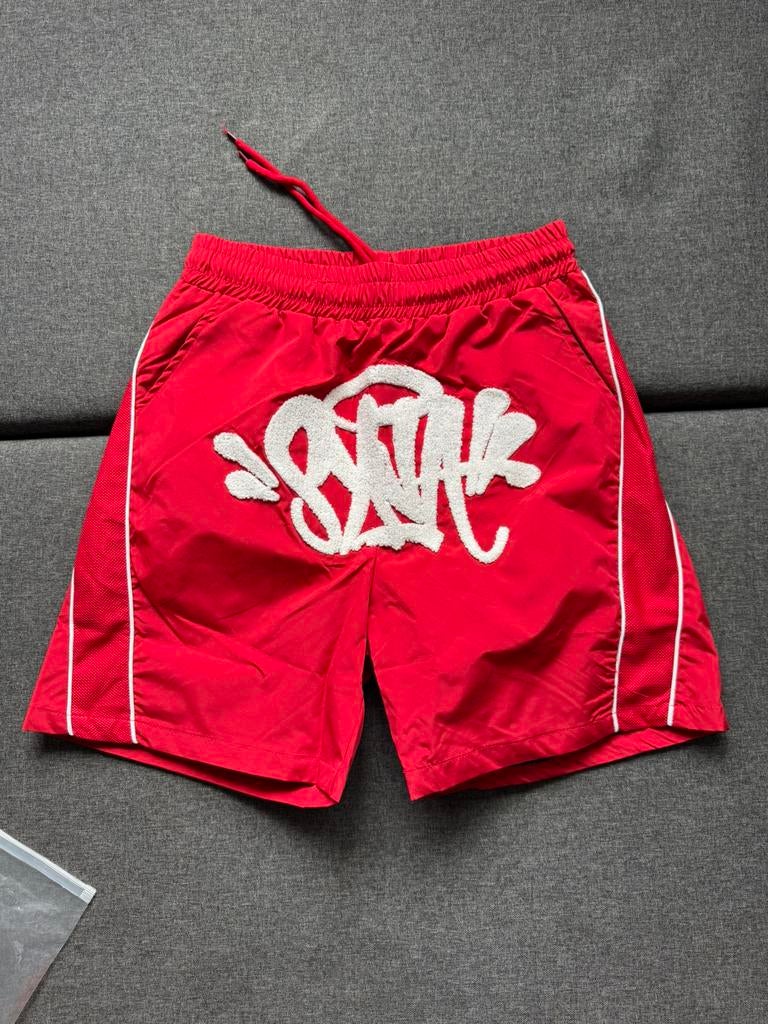 Syna word shortsM, Enfants & Bébés, Maillots de bain pour enfants, Enlèvement ou Envoi, Comme neuf