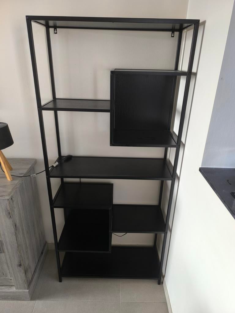 Open wandkast, Ophalen