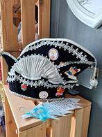 Carnaval steek met pins en medalies, Ophalen