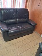 Een tweezit en een éénzit in leder., Ophalen