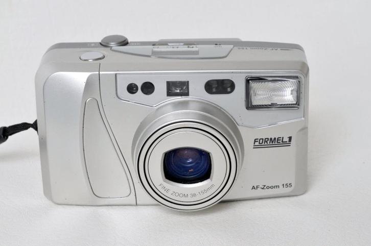 Formel 1 zilver + ZOOM 38-155 mm + behuizing., Audio, Tv en Foto, Fotocamera's Analoog, Gebruikt, Compact, Ophalen of Verzenden