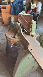 Hoeksnijmachine, Ophalen