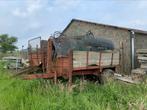 Kar met werkende (hout)kraan, Zakelijke goederen, Ophalen