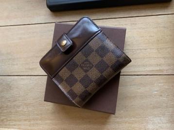 Mooie vintage portefeuille van Louis Vuitton. beschikbaar voor biedingen