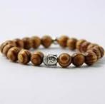 Wengé armband met zilverkleurige Boeddhakraal, Handtassen en Accessoires, Armbanden, Ophalen of Verzenden, Nieuw, Geel, Elastiek