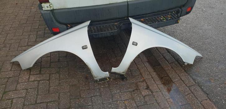 VOLVO S40   V40   VOORSCHERMEN BJ 97 TOT 2002, Auto-onderdelen, Carrosserie, Spatbord, Gebruikt, Ophalen of Verzenden