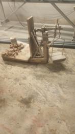 Bascule (weegtoestel), Ophalen