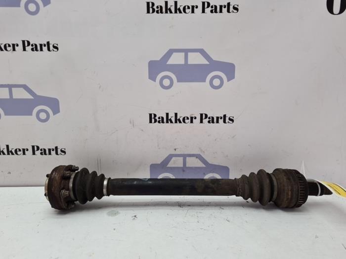 Aandrijfas links-achter van een BMW 1-Serie, Auto-onderdelen, Remmen en Aandrijving, BMW, Gebruikt, 3 maanden garantie