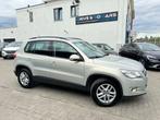 Volkswagen Tiguan 2.0 TDI 140PK DPF Sport * 1 JAAR GARANTIE, Auto's, Voorwielaandrijving, Stof, Gebruikt, Zwart