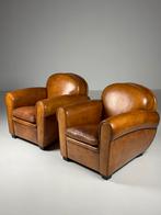 Set van 2 schapenleren clubfauteuils, Enlèvement