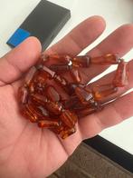 Amber ketting, Ophalen, Ketting