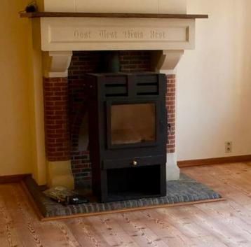 Houtkachel groot model recirculatie efficiente warmte beschikbaar voor biedingen