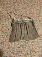 metalen dames handtasje, Ophalen