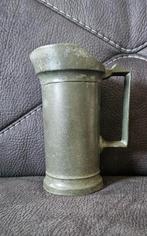 Tinnen kruik, Ophalen