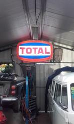 grande enseigne total, Ophalen, Zo goed als nieuw